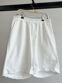 Conjunto deportivo Marfil – polo y short